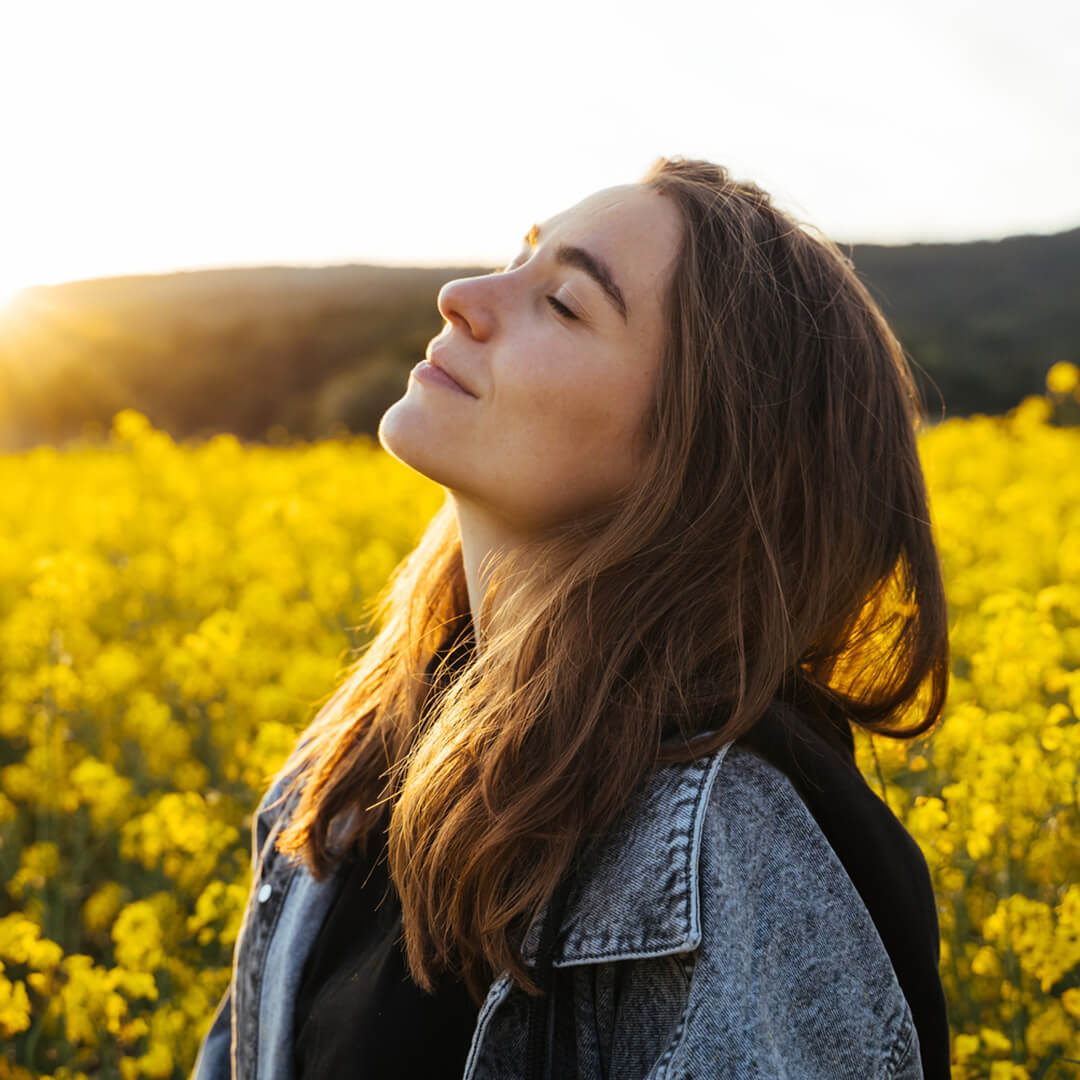 image of woman in flowers