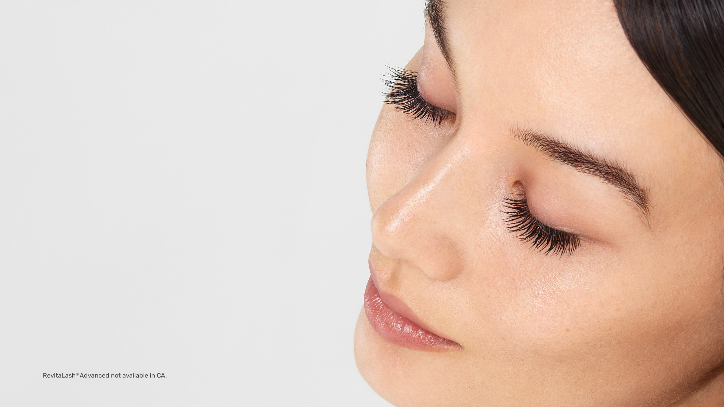Image of model showing off her lashes with closed eyes